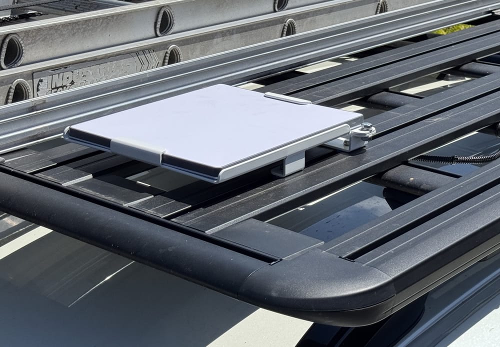 Starlink Mini Flat Mount CLICK X with Magnets – Secure and rugged, this magnetic mount offers easy installation and removal, designed to keep your Starlink Mini stable on any adventure, whether attached to a Rhino Rack platform or caravan roof.